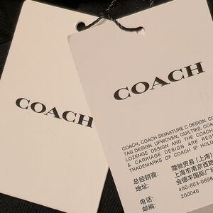Coach Navy Hoodie with White Graphics